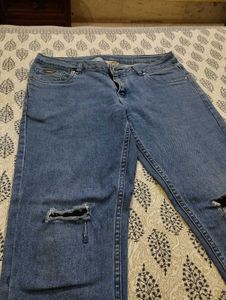 Distressed Blue Narrow Jeans