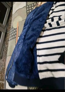 Blue Puffer Jacket with Plaid Lining sweater free