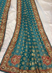 Stunning Teal Embellished Saree
