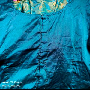 Teal Silk Blouse And Long Skirt( Pattupavada)