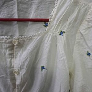 White Embroidered Peplum Top