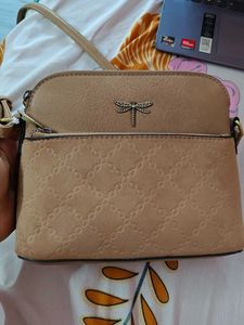 Tan Quilted Crossbody Bag with Dragonfly Charm