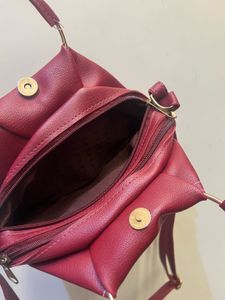 Maroon Handbag with Sling (cherry colour coded)