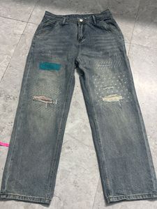Distressed Patchwork Denim Jeans