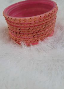 12 Pink Beaded Bangles