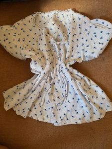 Chic Floral Wrap Peplum Top first pic is inspo
