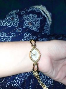 Elegant Gold Tone Oval Watch