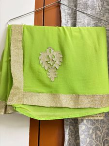 Vibrant Green Saree with Golden Border