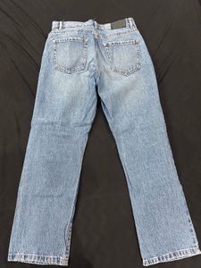 Distressed Blue Denim Jeans