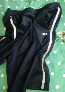Reebok training shorts.