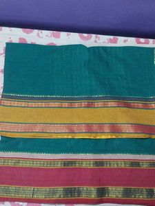 Dark green &amp; maroon Saree with golden  peacock