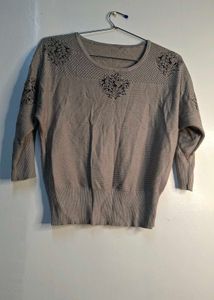 Stylish Women's Knit Top with Embellishments