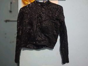 statement embellished blouse