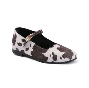pair of multicoloured Mary Janes