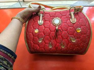 Elegant Red Embellished Handbag