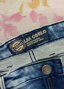 Distressed Blue Wash Denim Jeans