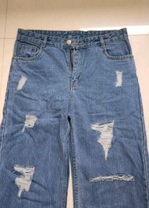 Ripped Wide Leg Denim Jeans