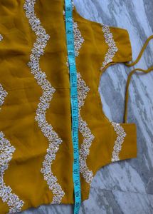 Yellow Embellished Sleeveless Blouse