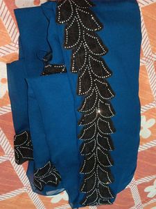 Elegant Teal Saree with Black Embellishments
