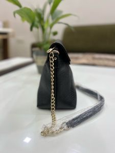 Leather Sling Bag.