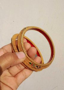Exquisite Gold-Tone Bangles with Red Enamel Inlay