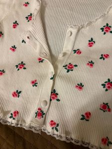 Coquette white rib-knit floral baby tee