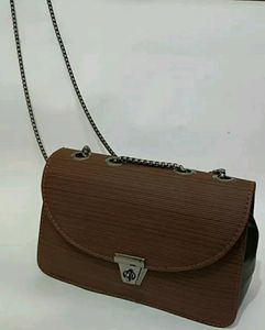BROWN SOLID BUCKLE CHAIN SLING BAG (TOTALLY NEW)