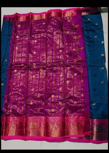 Stunning Teal Saree with Pink Border