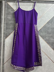 Elegant Purple Kurta Set with Intricate Embroidery