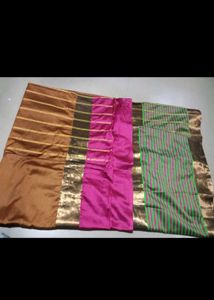 Vibrant Striped Silk green golden Saree
