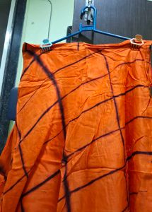 Vibrant Orange Ethnic Skirt with Tie-Dye Pattern