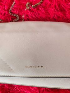Chic Cream Crossbody Bag with Gold Chain