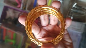 Set of 4 Elegant Gold Bangles