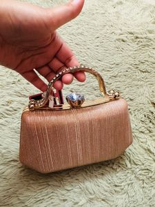 Elegant Rose Gold Clutch Bag