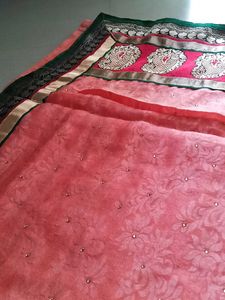 Beautiful netted peach colour Saree