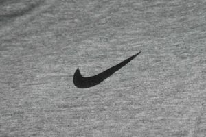a symmetrical Nike Grey T-Shirt