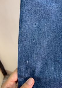 Distressed Blue Denim Jeans