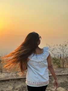 White Sleeveless Embroidered Top