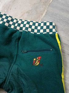 Green Track Pants with Yellow Stripes