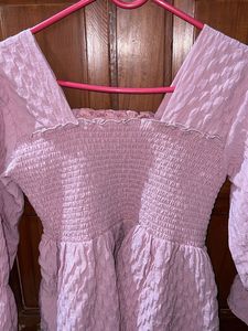 Chic Pink Smocked Peplum Top