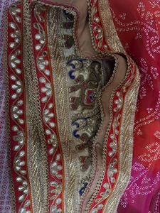 Red Bandhani Designer Saree with Gold Blouse