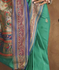 Elegant Teal Saree with Gold Border
