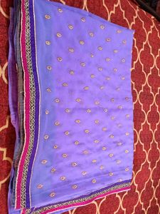 Beautiful Lavender Saree with Gold Embellishments