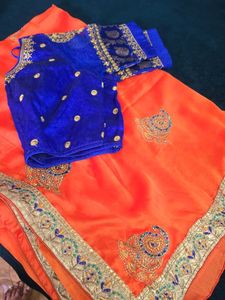 Orange saree +Blue Embroidered Blouse