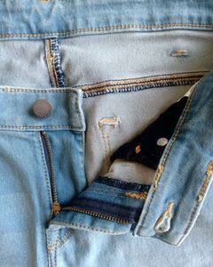 Light Wash Jeans with Green Stripe
