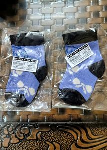 Two Pairs Of Brand New Baby Socks .. Never Used