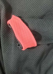 Chic Black Textured Top with Coral Cuffs