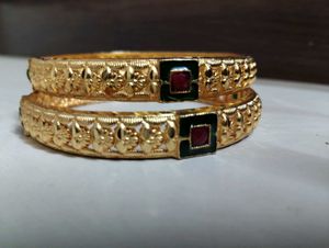 Elegant Gold Bangles with Gemstone Accents