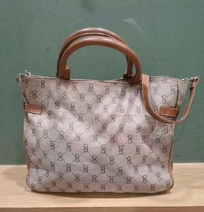 Stylish Oriflame Monogram Handbag