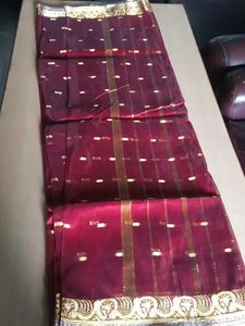 Elegant Maroon Saree with Gold Embellishments